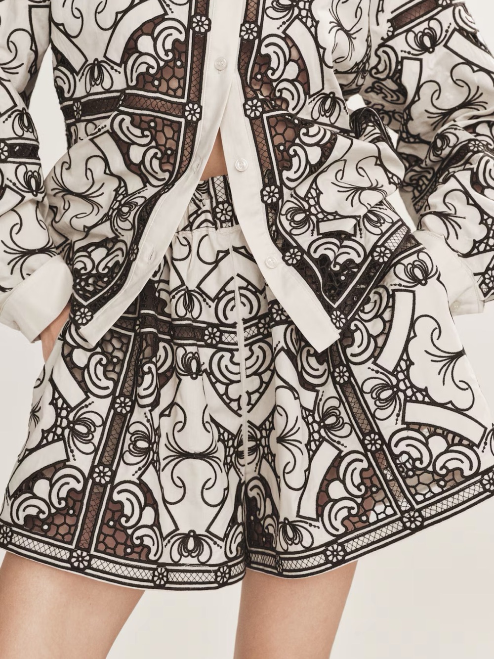 H&M cream and black eyelet embroidery paper bag shorts